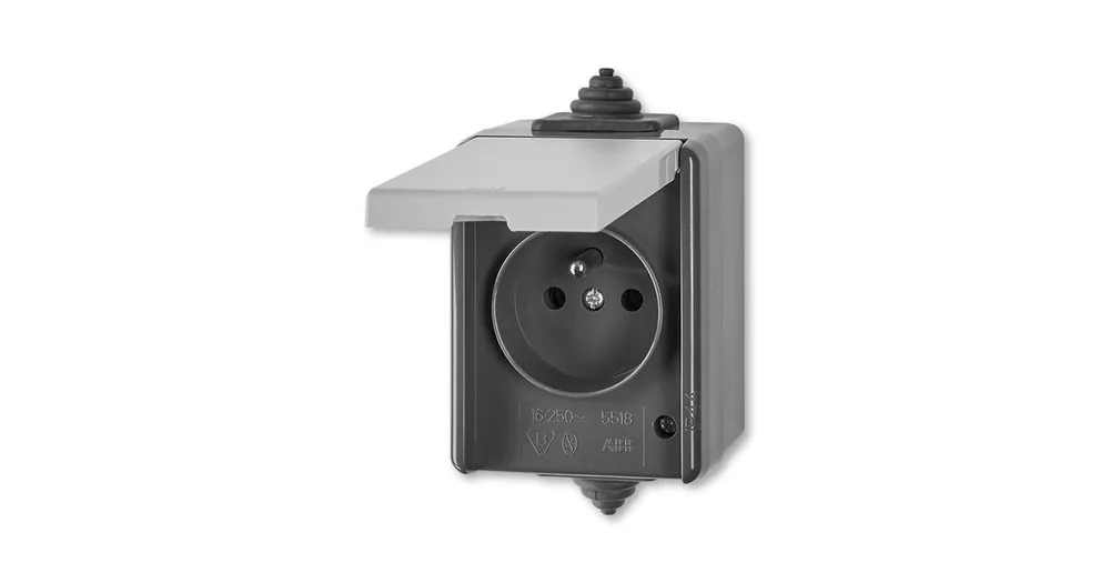 ABB Praktik 5518-2969 S Zásuvka jednonásobná IP 44, s ochranným kolíkem, s víčkem, šedá vhodné na dřevo bez podložky Nová Kolekce